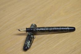 A Parker Televisor Slender button fill fountain pen in lined green with three gold cap bands