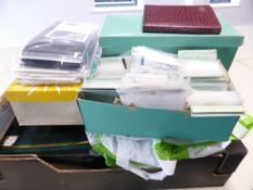 WORLDWIDE BOX OF ALBUMS, PACKETS, COVERS ALL ERAS MINT AND USED Accumulation of world material