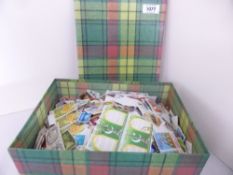 WORLDWIDE OFF PAPER STAMP COLLECTION IN SHOEBOX - SEVERAL THOUSAND STAMPS Shoe box with off paper