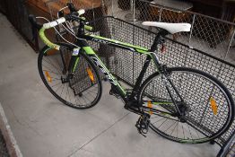 A Felt F95 team road bike in green/black color, frame h77cm