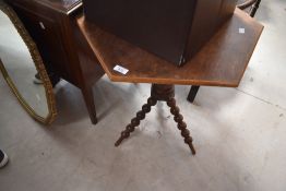 A 19th century gypsy table having hexagonal top raised on bobbin style legs, h69cm Condition report: