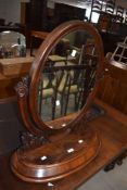 A mahogany oval dressing table mirror, h79cm