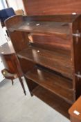 An oak open bookcase with four tiers 12cm x 87cm x 28cm