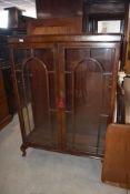 An early-mid 20th century mahogany china/display cabinet, of traditional design with two glazed