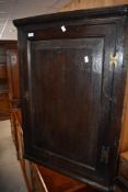 A 19th century oak corner cabinet, h91cm x w64cm x d35cm