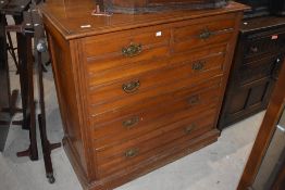 An Edwardian walnut chest of drawers, having 2/3 arrangement with moulded detail 102cm x 103cm x