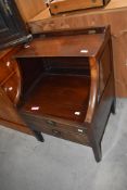 A 19th century commode having two dummy drawers, h76cm x w57cm x d30cm
