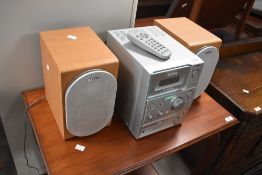A Sony CMT-CP101micro music system with speakers