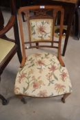 A late 19th / early 20th century slipper chair having floral upholstery, h78cm
