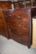 A 19th century mahogany bow-fronted chest of drawers having a 2/3 arrangement of cockbeaded