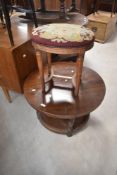 A vintage stool having upholstered oval top raised on fluted legs, h45cm, sold together with a