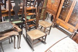 A 19th century rocking chair having slatted back and wicker seat, h95cm, sold together with a