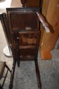 A 19th century mahogany fold-over tea table, with central drawer and turned supports (one leg AF)