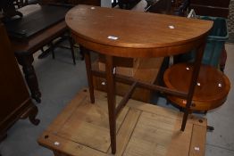 A 20th century mahogany demi-lune side table 73cm high