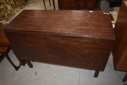 A 19th century mahogany drop leaf dining table, L107cm
