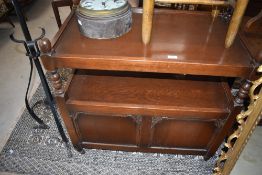 A 20th century stool having wicker top, h47cm, sold together with a vintage tea trolley, (2)
