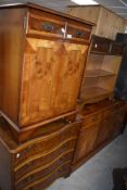 A vintage yew wood sideboard having three drawers and 3 cabinet doors, L135cm x H80cm x D40cm,