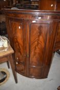 A early 20th century mahogany corner cabinet, h120cm