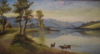 A Victorian oil on canvas, lake or Scottish loch scene with cattle watering, unsigned, indistinct