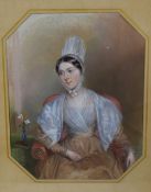 A 19th century oil on board, portrait of a lady, modelled seated wearing a bonnet and period