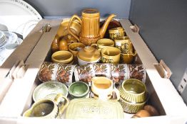 A Royal Worcester Pallisey part tea service decorated with foliage on a cream ground, sold
