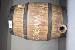 A Moira stoneware spirit flask, modelled as a coopered wooden barrel having scripted label