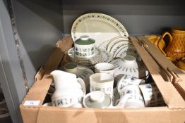 A Royal Doulton Tapestry pattern tea service, decorated with fruit and foliage on an ice white