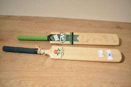 Two Miniature Cricket Bats, Gunn & Moore bearing signatures from England Players, Vaughan,