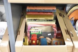 A group of wooden toy trains, sold together with a Boys and Girls book and a yo-yo ect.