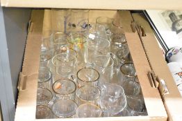 A job lot of glass tankards and sherry glasses, to include a Vale Lodge Mason glass and a half