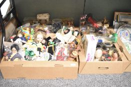 A large collection of dolls of the world in three cartons.