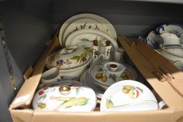 A Royal Worcester Evesham pattern porcelain dinner part service, decorated with gold colour edging