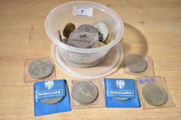 A small box of assorted vintage coins including a selection of assorted commemorative coins, two