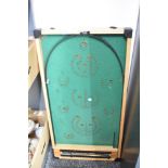 A vintage Kay of London bagatelle board.