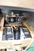 A pair of Cross Channel 40x70 binoculars in carrying case, a Eumig Mini 3 Zoom Reflex cine camera