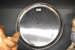 A Keswick School of Industrial Art circular tray 36cm circumference.