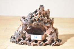 A hand carved Chinese soap stone sculpture