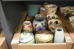 Eight assorted vases including an Arthur Wood lustre vase and four biscuit jars including Maling