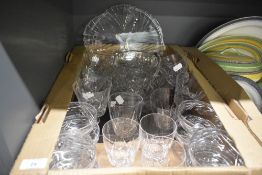 A crystal cut glass water jug decorated with diamond patterns and globular handle, h14.5cm, sold