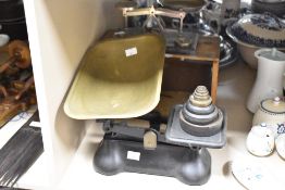 A Johnson of Hendon balance scale with glass and wood display case, w31cm, sold together with