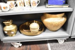 A large Eastern brass jardinière, of baluster form 27cm high, sold together with a lidded jar and