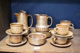 A 20th century Wedgwood Pennine pattern tea service, decorated with geometrical designs on a brown