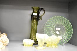 A green glass bowl having a wavy pattern, w21.5cm, sold together with a glass pitcher ect