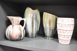A group of three mid century Sylvac pottery wares, comprising two jugs and a vase, each with mottled