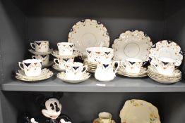 A 20th century CW&Co china tea set, decorated with floral swags, 37 pieces approximately