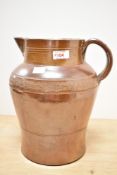 A 19th century salt-glazed stoneware jug, of generous proportions and decorated with a band of
