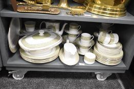 A Royal Doulton 'sonnet' pattern dinner service, having gilt edges and floral designs, to include