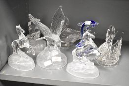 A selection of moulded glass ornaments , animalistic studies