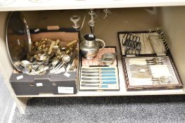 A quantity of silver plated cutlery, to include a box of spoons and a canteen of knifes ect