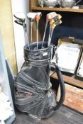 A selection of Dunlop and Ping golf clubs in Hippo bag